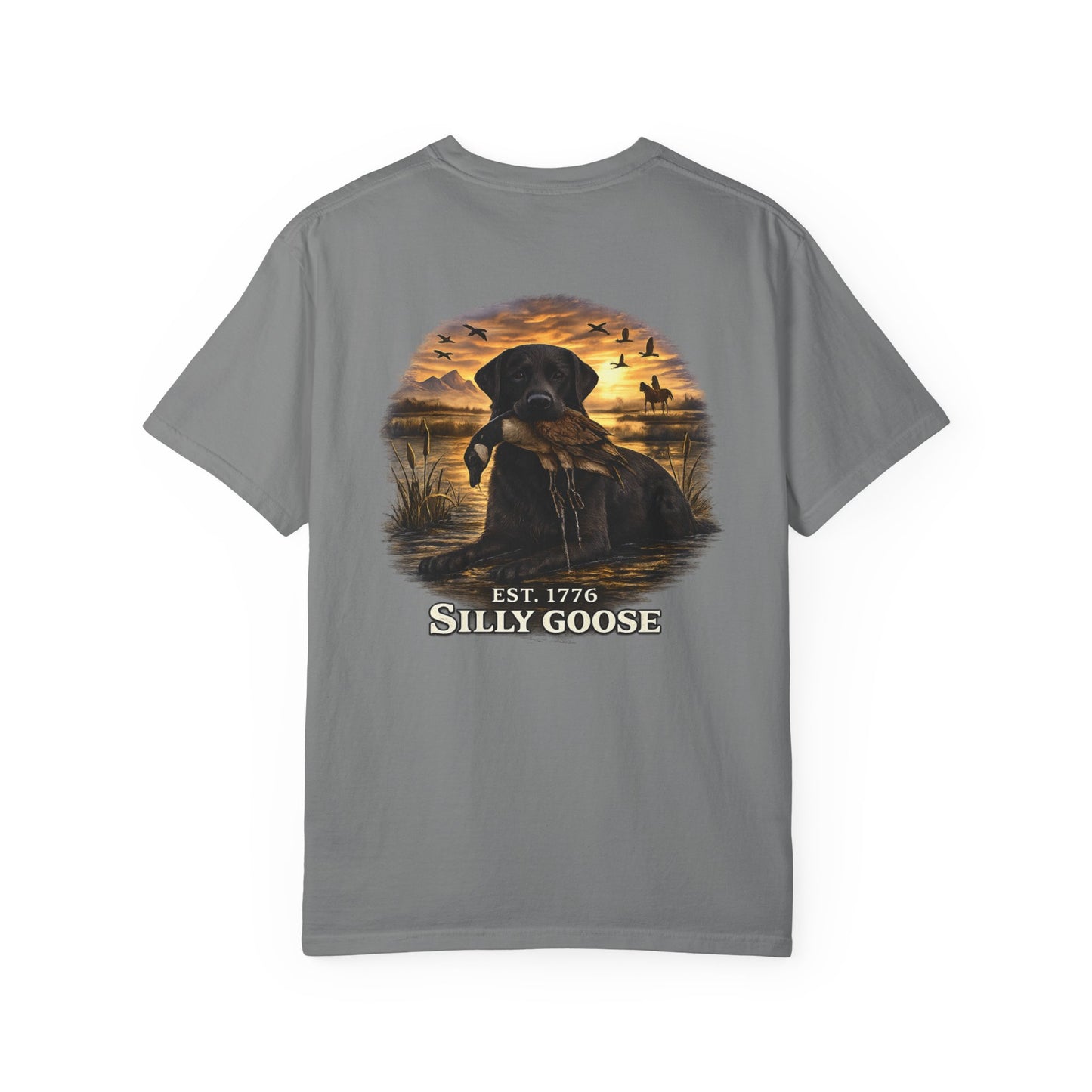 Gray t-shirt with a graphic of a dog and sunset scene on a white background