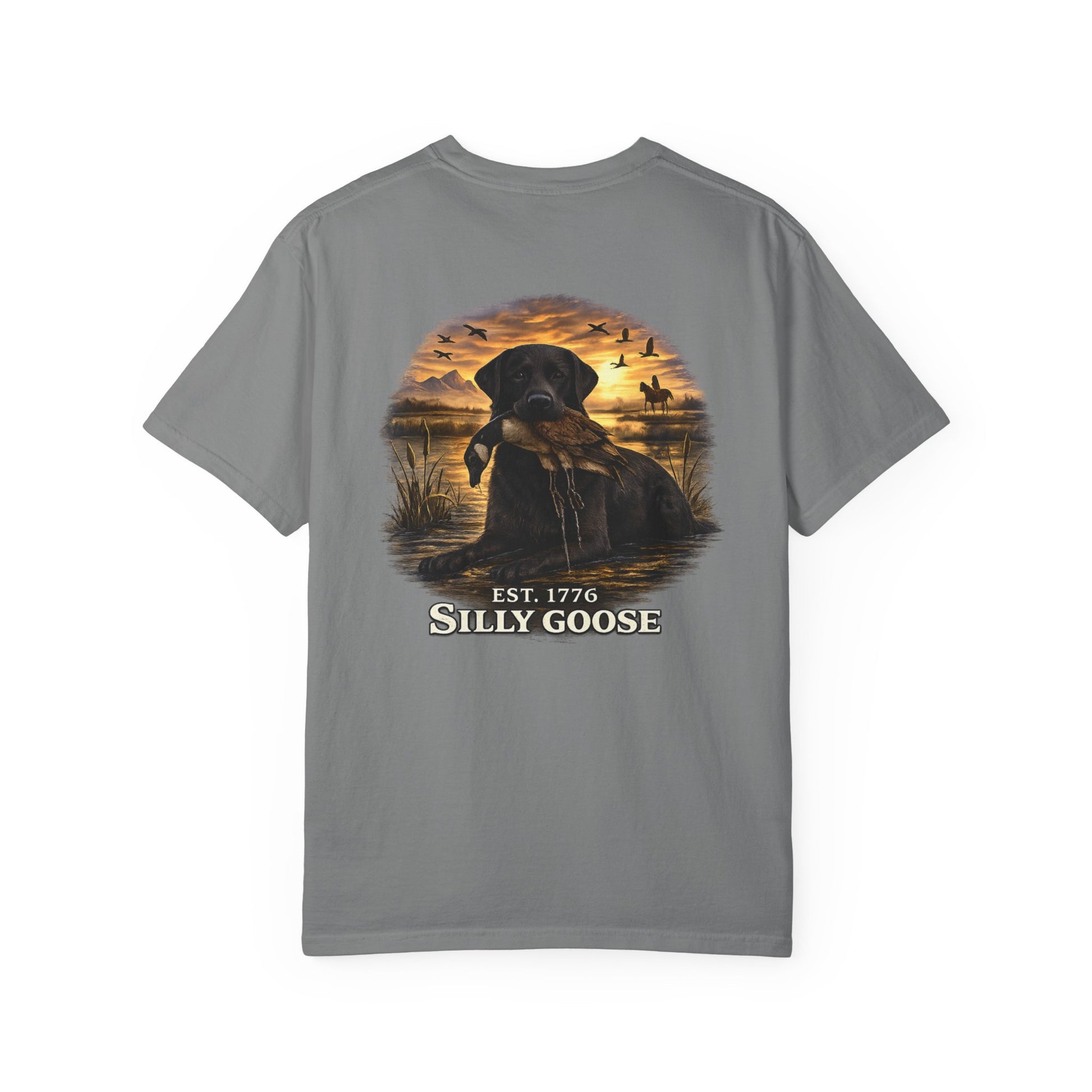 Gray t-shirt with a graphic of a dog and sunset scene on a white background