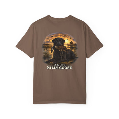 Brown t-shirt with a graphic of a dog and sunset scene on a white background