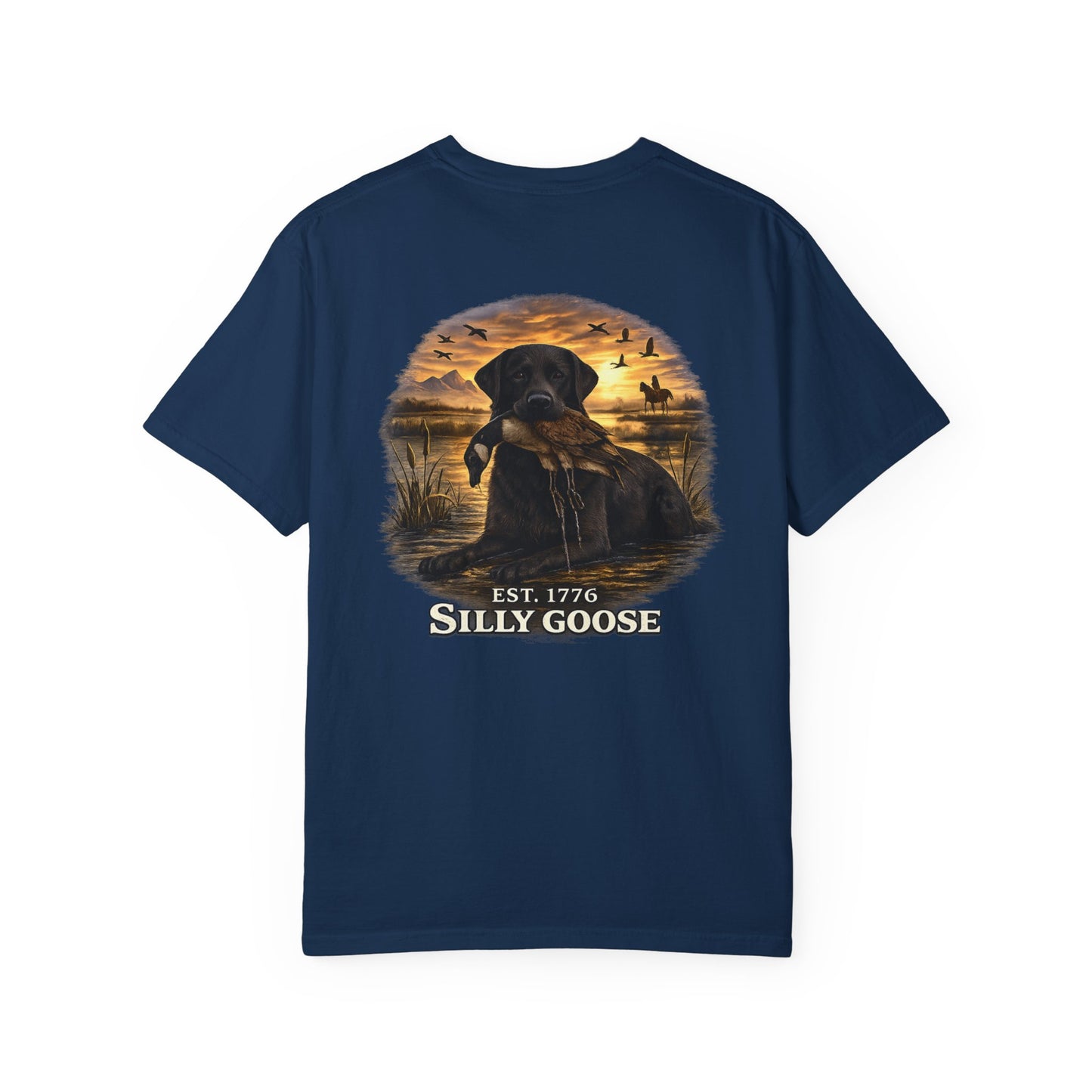 Navy blue t-shirt with a graphic of a dog and ducks in a field, featuring the text 'Est. 1776 Silly Goose'.