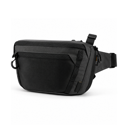A black and dark gray crossbody bag with an adjustable strap, shown from a three-quarters angle on a white background.