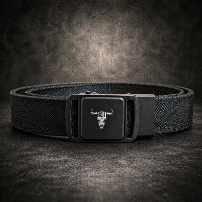 Black belt with a buckle featuring a bull skull design on a dark background