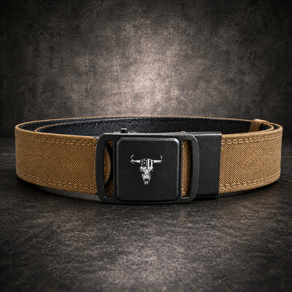 Brown belt with black buckle featuring a skull design on a dark background