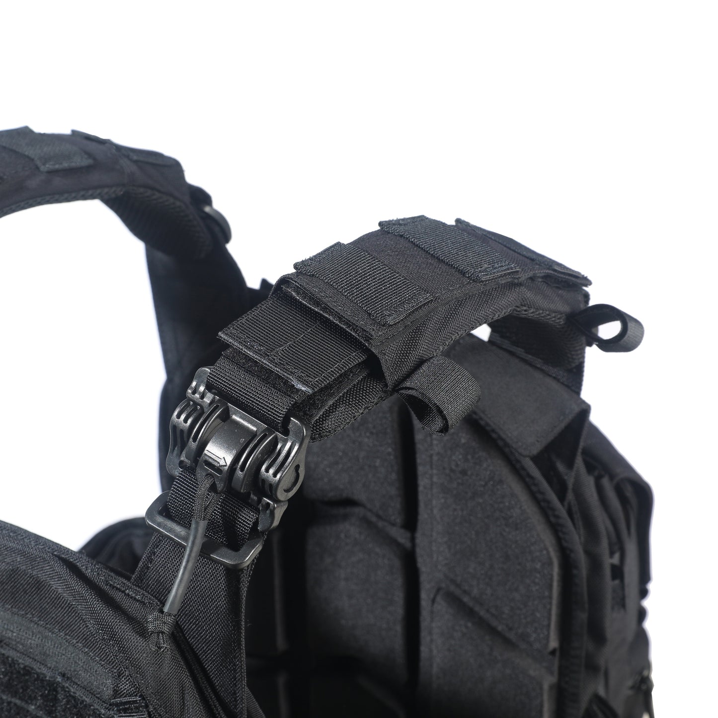 Black tactical vest with straps on a white background