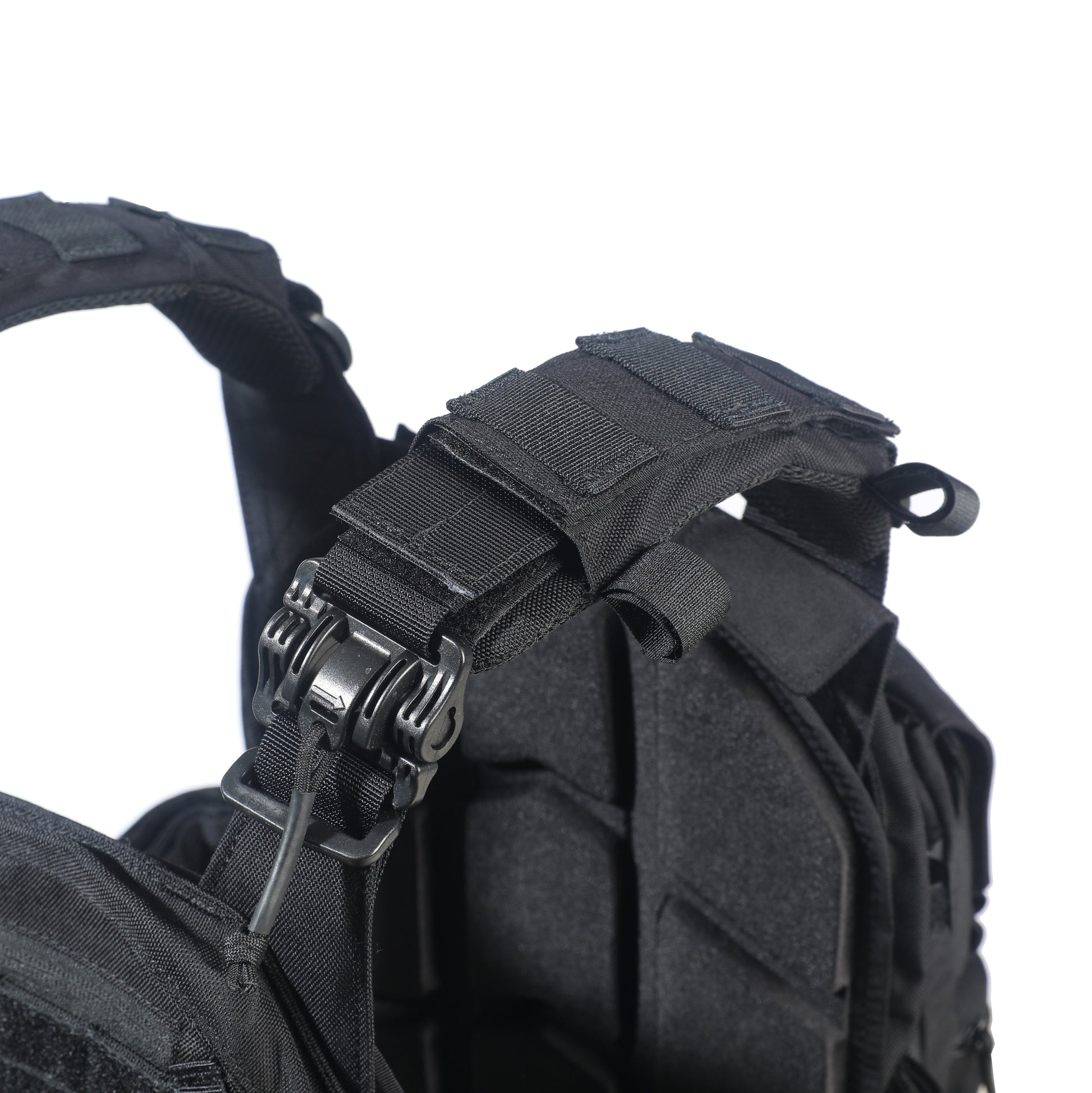 Black tactical vest with straps on a white background